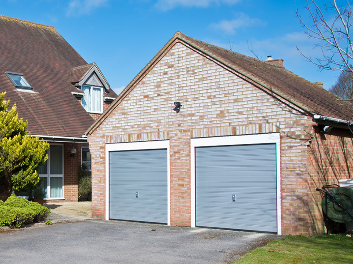 Radi bi povečali vhod v garažo. Lahko uporabimo že obstoječa garažna vrata?